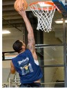 student playing basketball in new fitness center