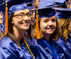 two female students graduating from FRCC