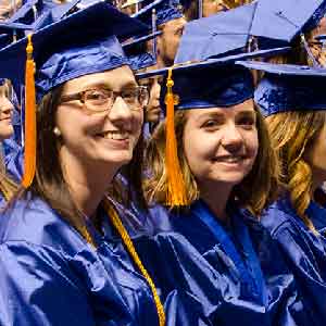 two female students graduating from FRCC