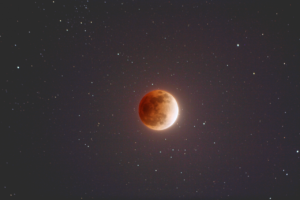 Artist's enhancement of a full eclipsed moon.