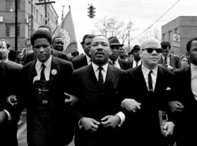 Martin Luther King, Jr. leading the march from Selma to Montgomery to protest the lack of voting rights for African Americans. Beside King are John Lewis, Reverend Jesse Douglas, James Forman and Ralph Abernathy. (Photo by Steve Schapiro/Corbis via Getty Images)