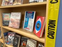 Banned books with caution tape