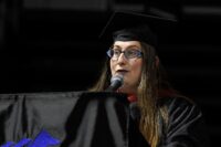 Amanda at the graduation podium