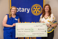 Rotary Club handing big check to Foundation