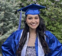 Melissa in her blue cap and gown