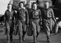black and white photo of four female pilots from WWII