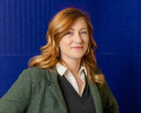 Chelsea headshot in green blazer